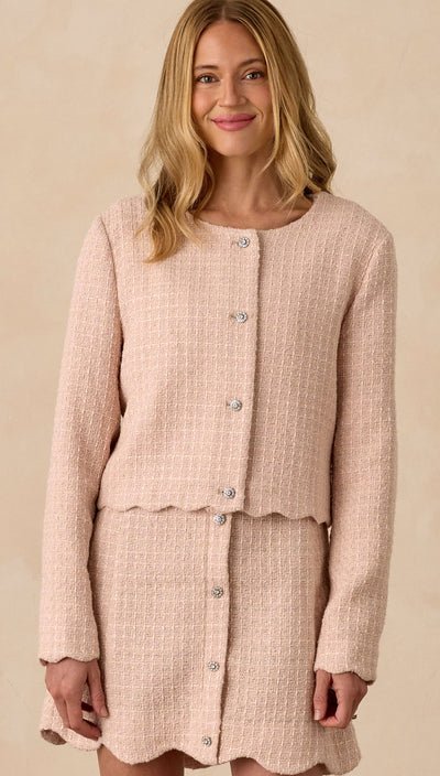 Woman wearing a beige textured suit on a beige background Tweed Jacket | Rose | Noralee
